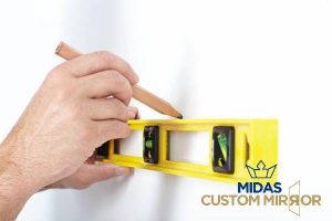 forgetting-to-use-a-spirit-level-8-common-mistakes-to-avoid-when-installing-custom-wall-mirrors-in-singapore-wall-mirror-midas-custom-mirror-singapore